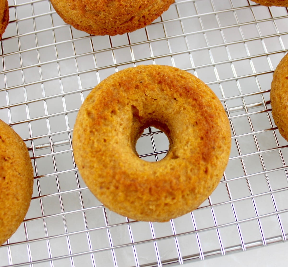 closeup of Keto Pumpkin Donut on cooling rack