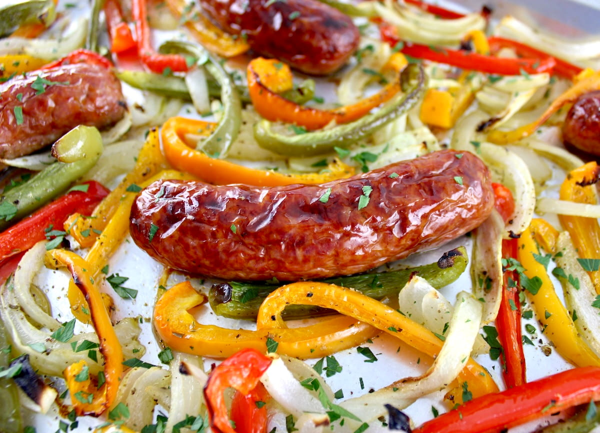 closeup of Sheet Pan Sausage and Peppers on baking sheet
