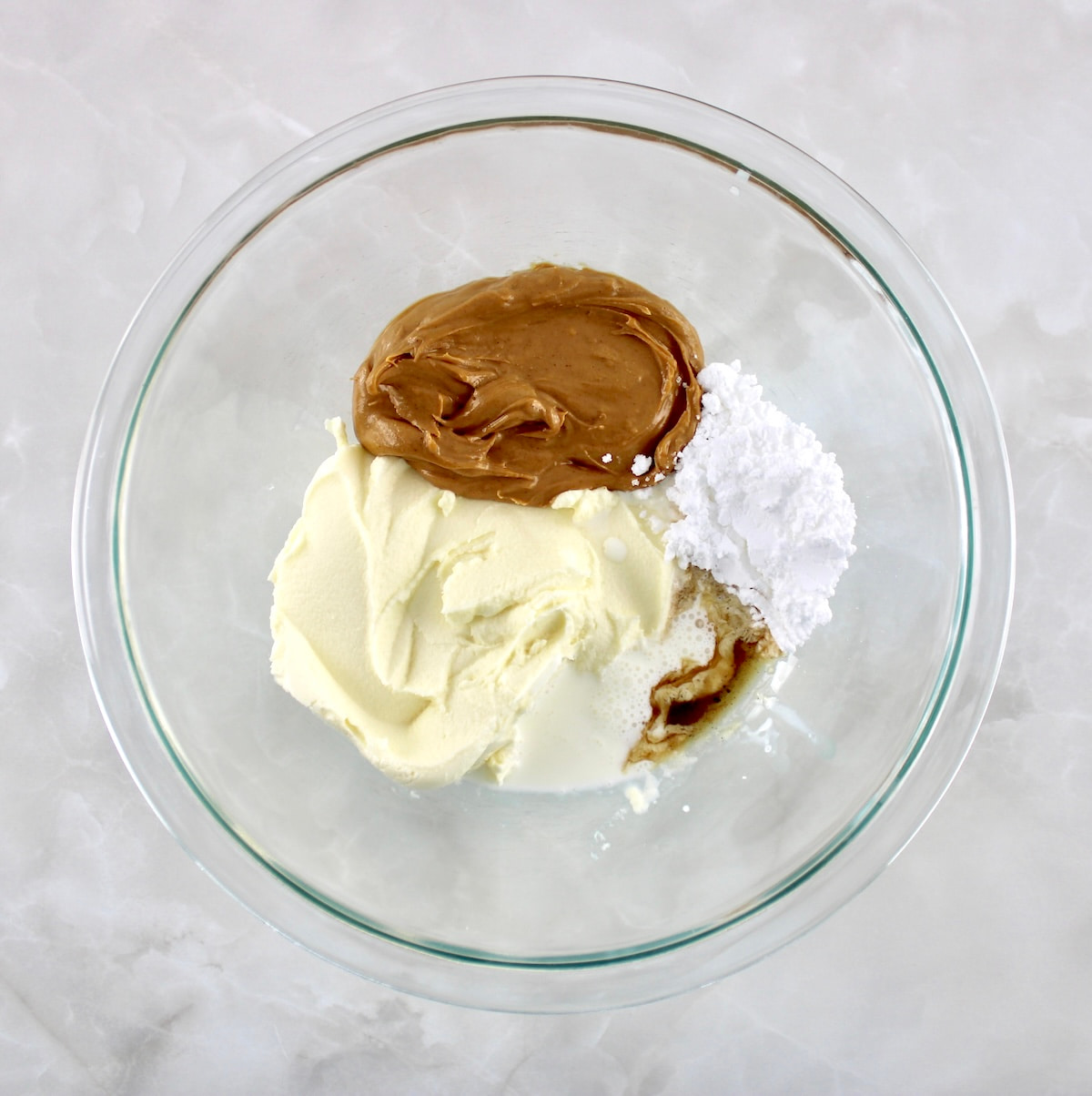 Chocolate Peanut Butter Truffles ingredients in glass bowl unmixed
