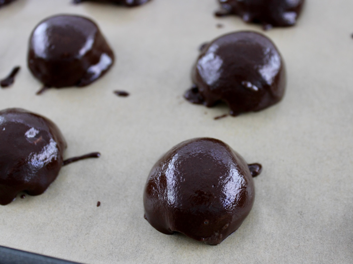 Chocolate Peanut Butter Truffles on parchment paper