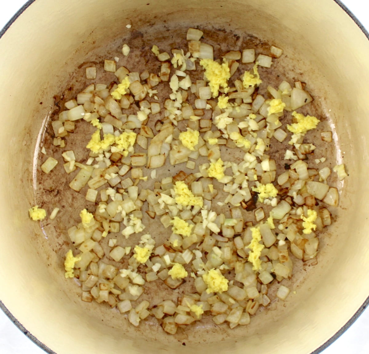 chopped onions, garlic and ginger in pot