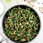 overhead view of Green Beans Almondine in skillet
