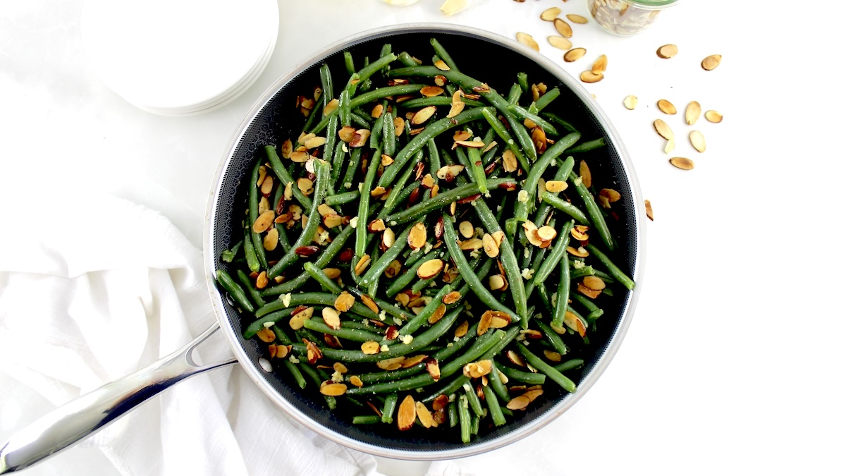 overhead view of Green Beans Almondine in skillet