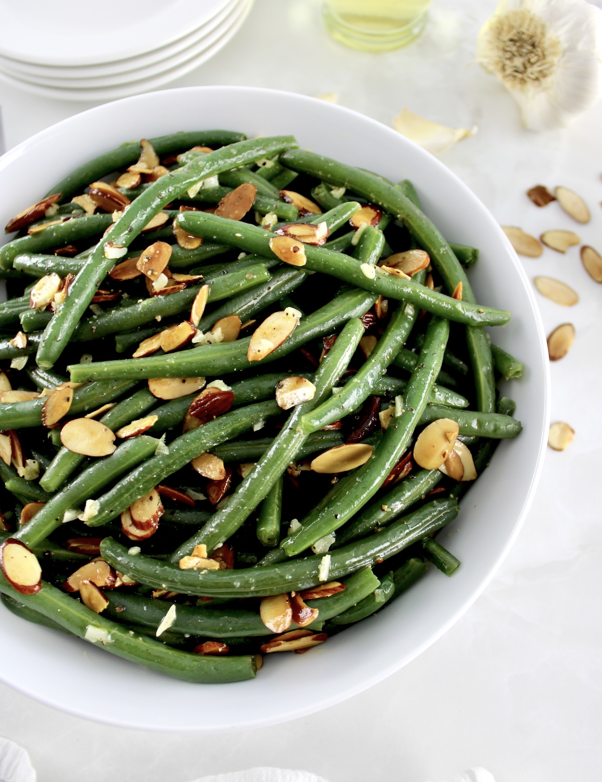overhead view of Green Beans Almondine in white bowl