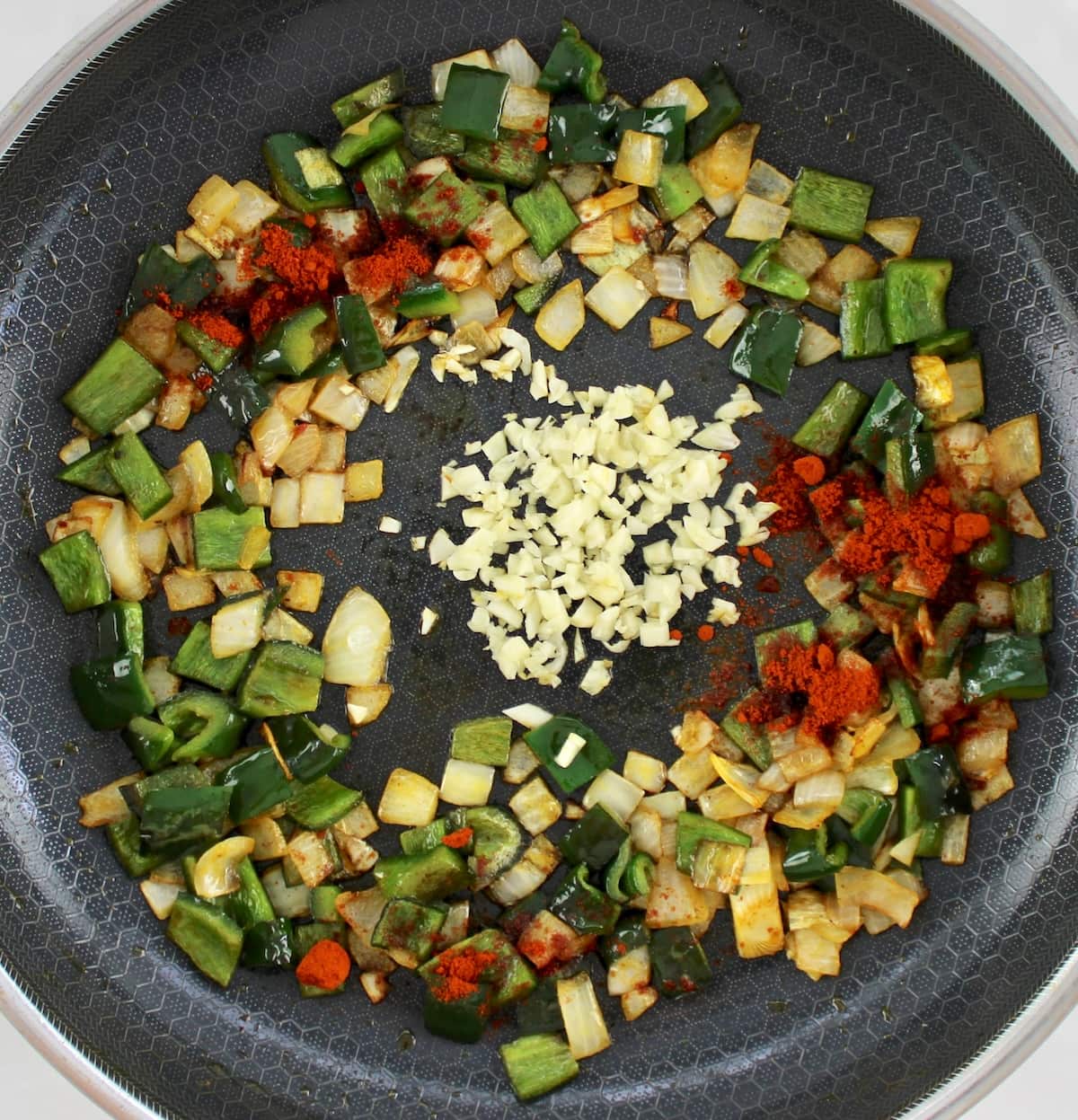 sauteed poblano, onions and garlic in skillet