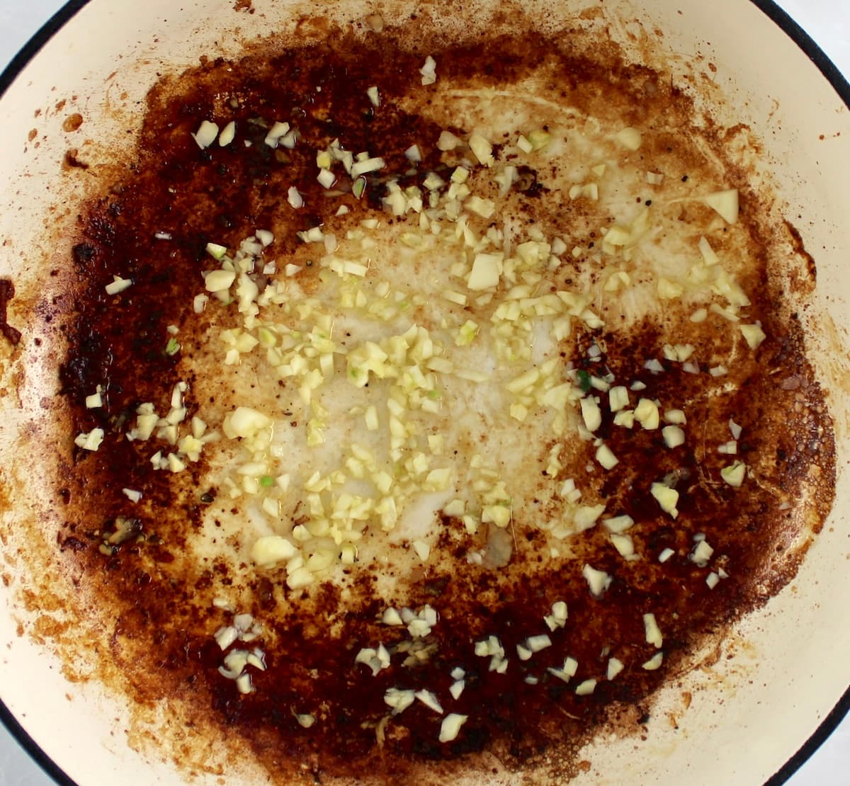 garlic cooking in skillet