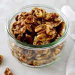 Candied Walnuts in open glass jar