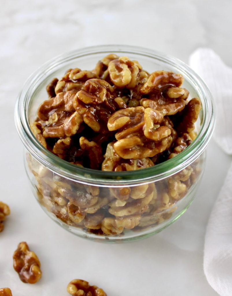 Candied Walnuts in open glass jar
