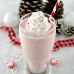 Keto Peppermint Chip Milkshake in glass with whip cream on top