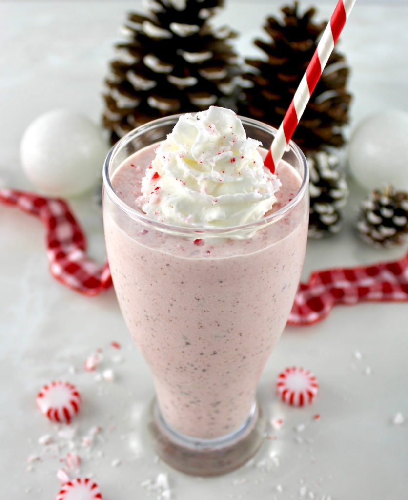 Keto Peppermint Chip Milkshake in glass with whip cream on top