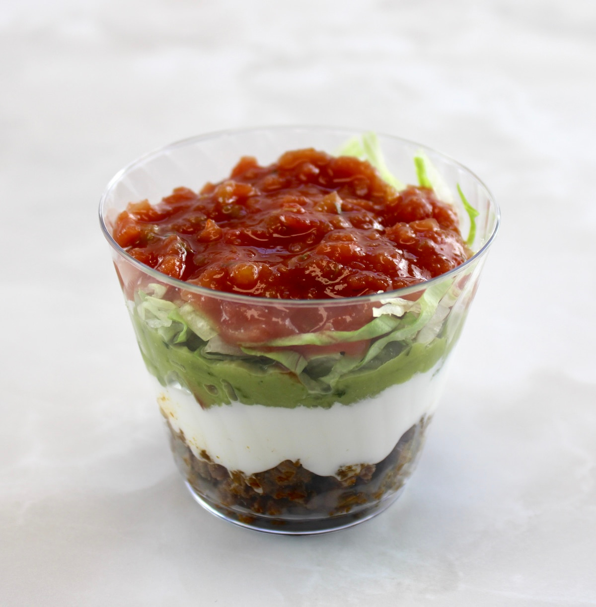 Taco Dip Cup with salsa on top