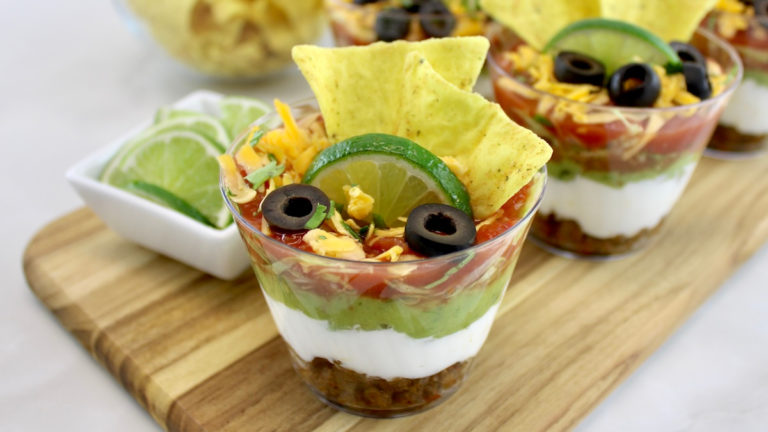 Taco Dip Cups on cutting board