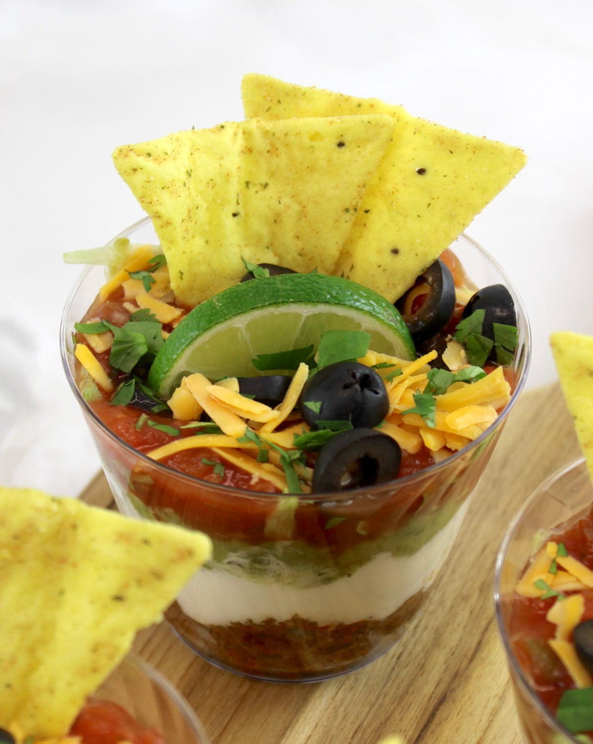 closeup of Taco Dip Cup on cutting board