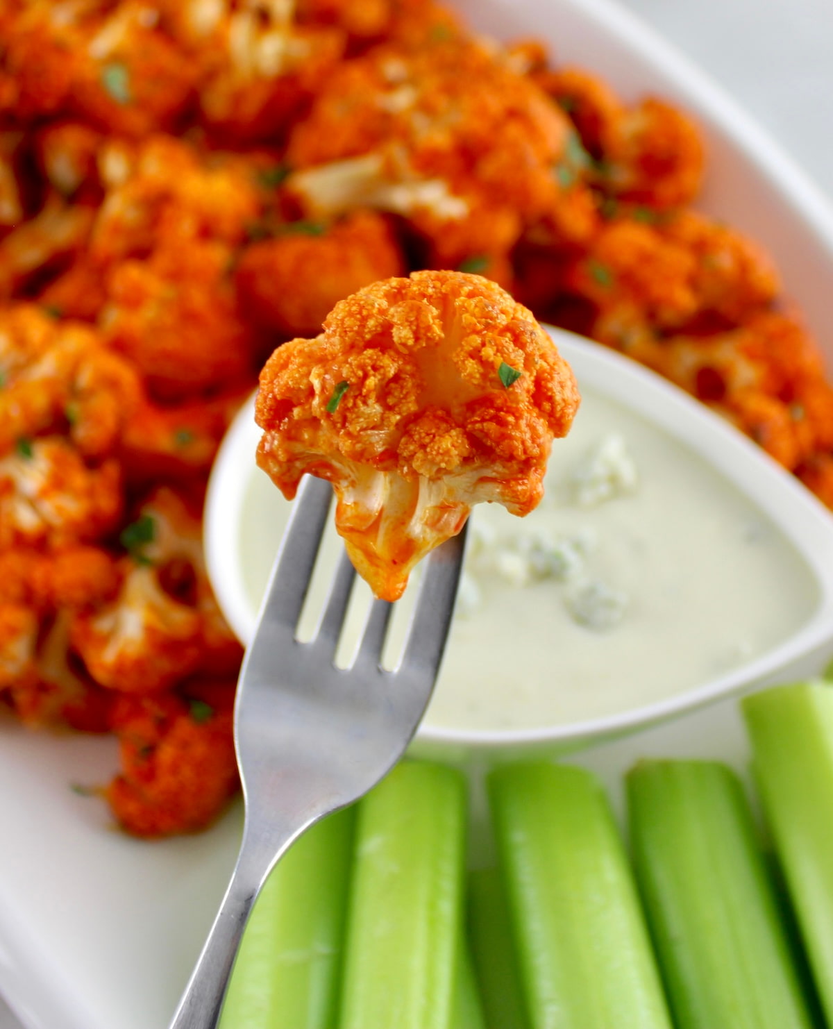 Air Fryer Buffalo Cauliflower on fork