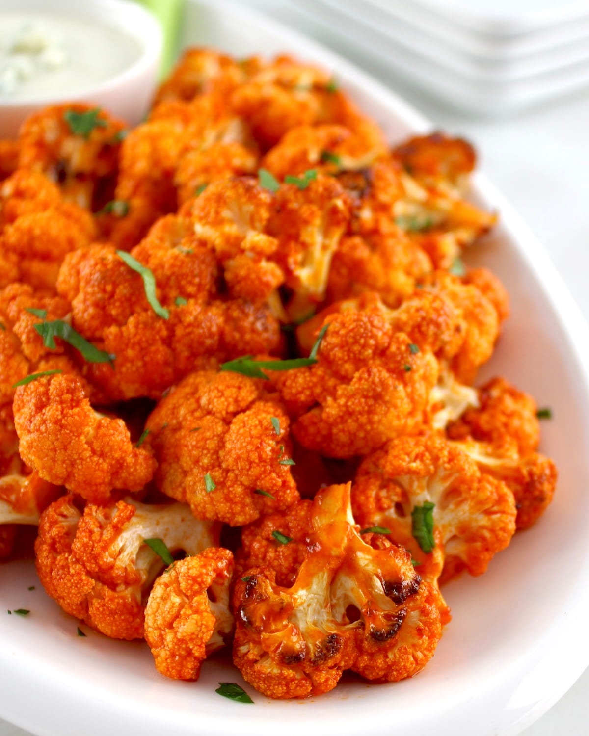 closeup of Air Fryer Buffalo Cauliflower on white plate