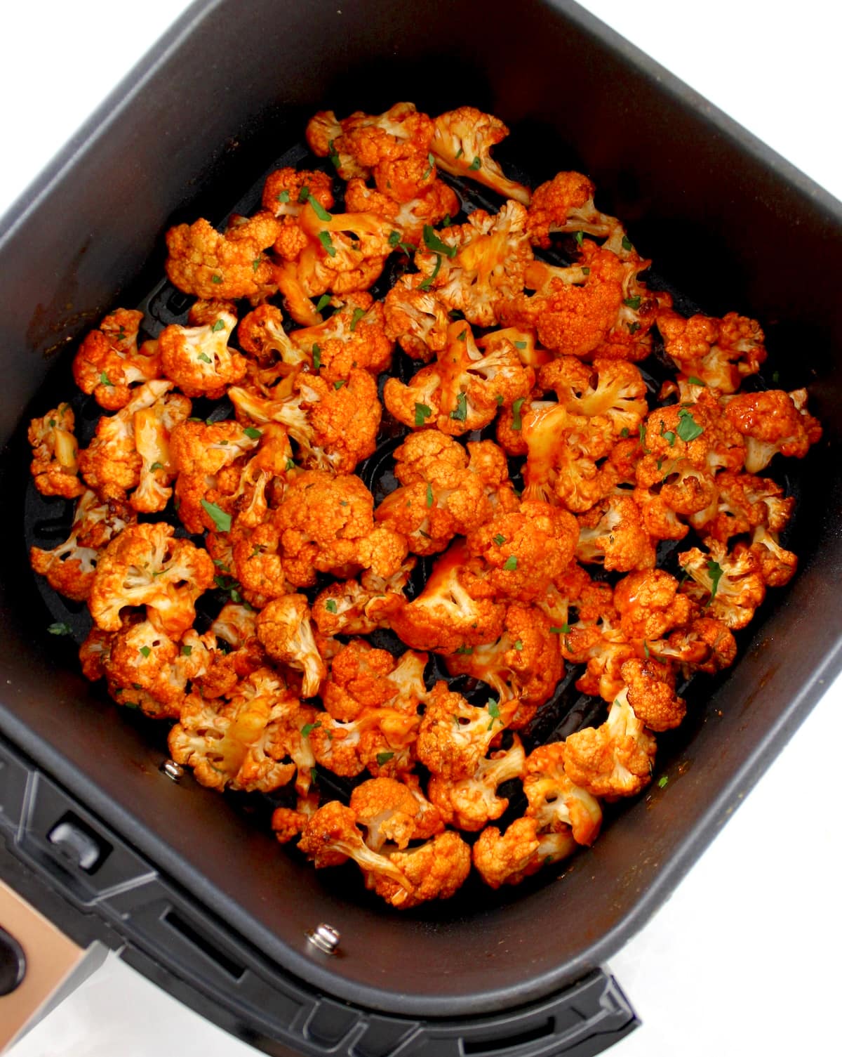 Air Fryer Buffalo Cauliflower in air fryer basket