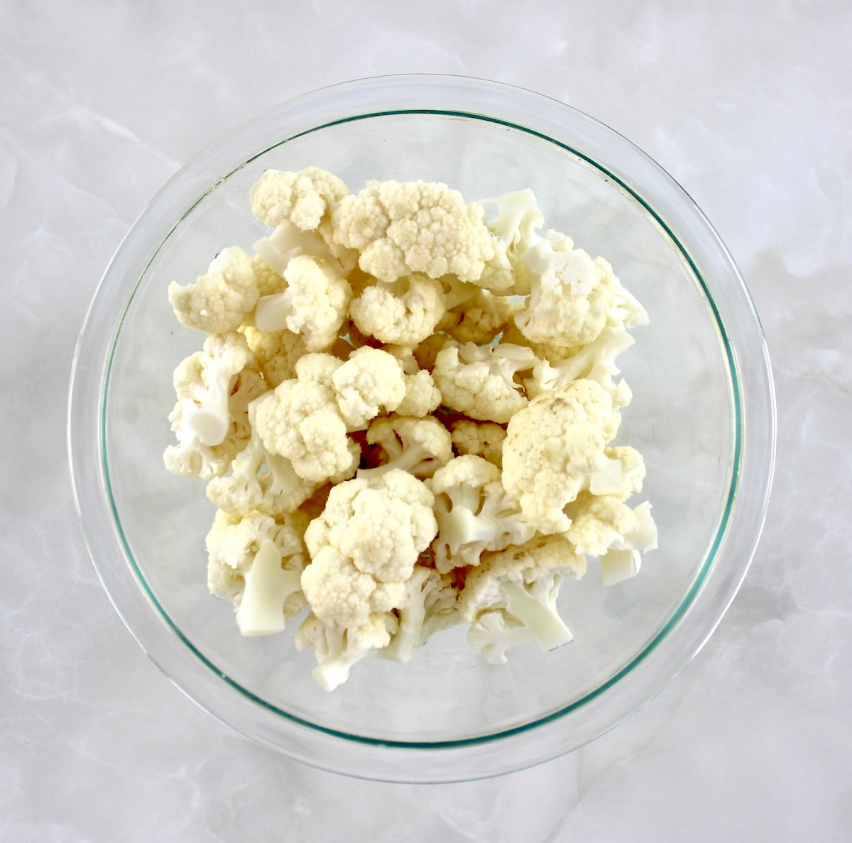 cauliflower florets in glass bowl