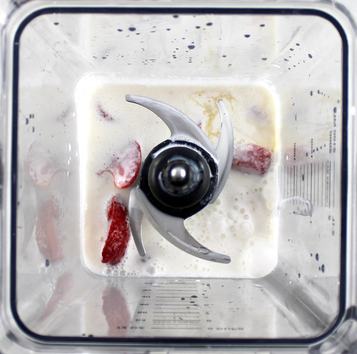 Keto Strawberry Milkshake in blender unmixed