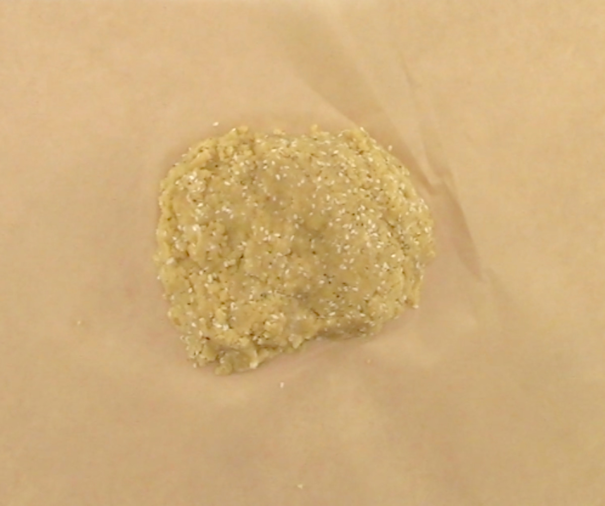 Sesame Almond Flour Crackers dough on parchment paper