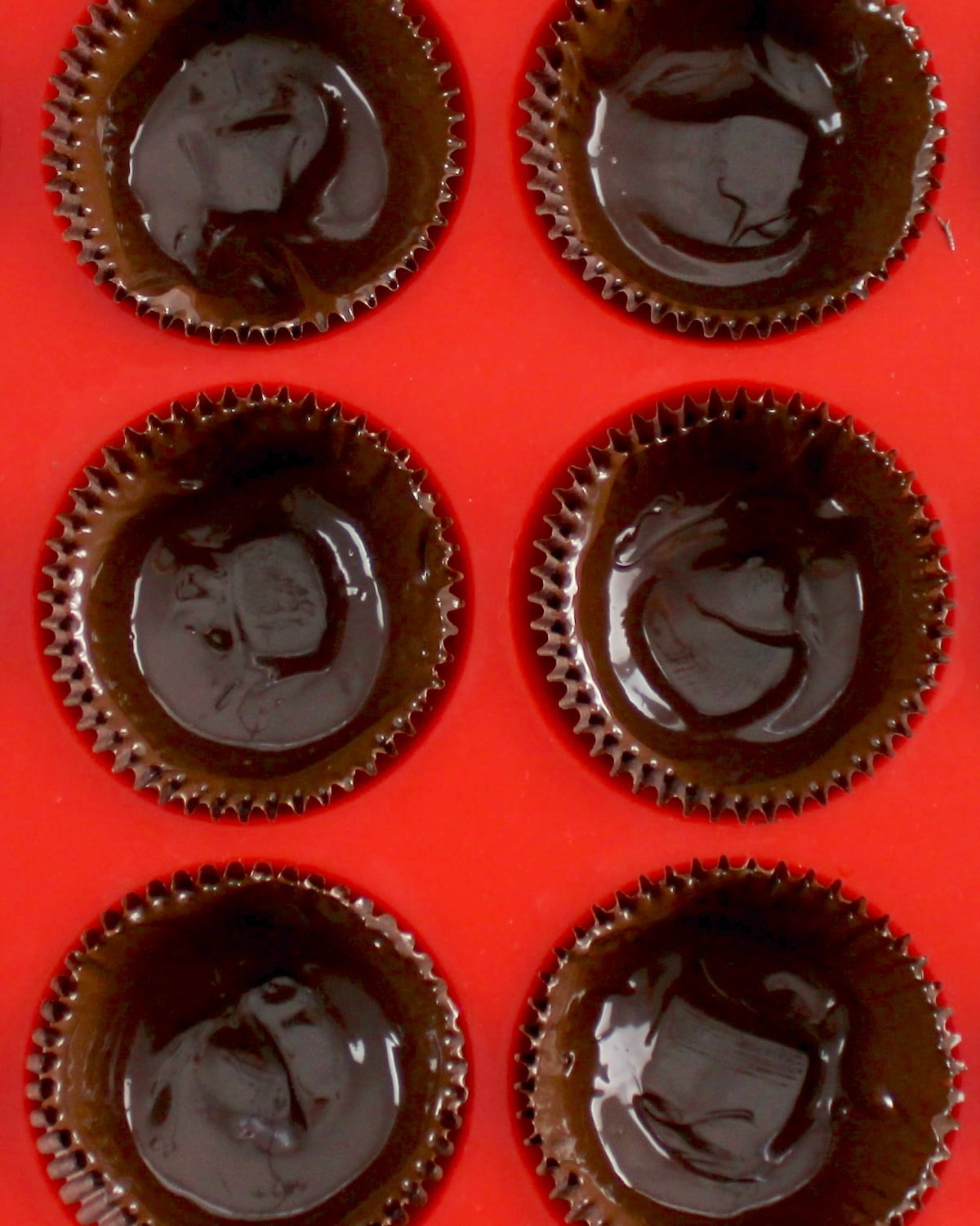 melted chocolate in cupcake liners