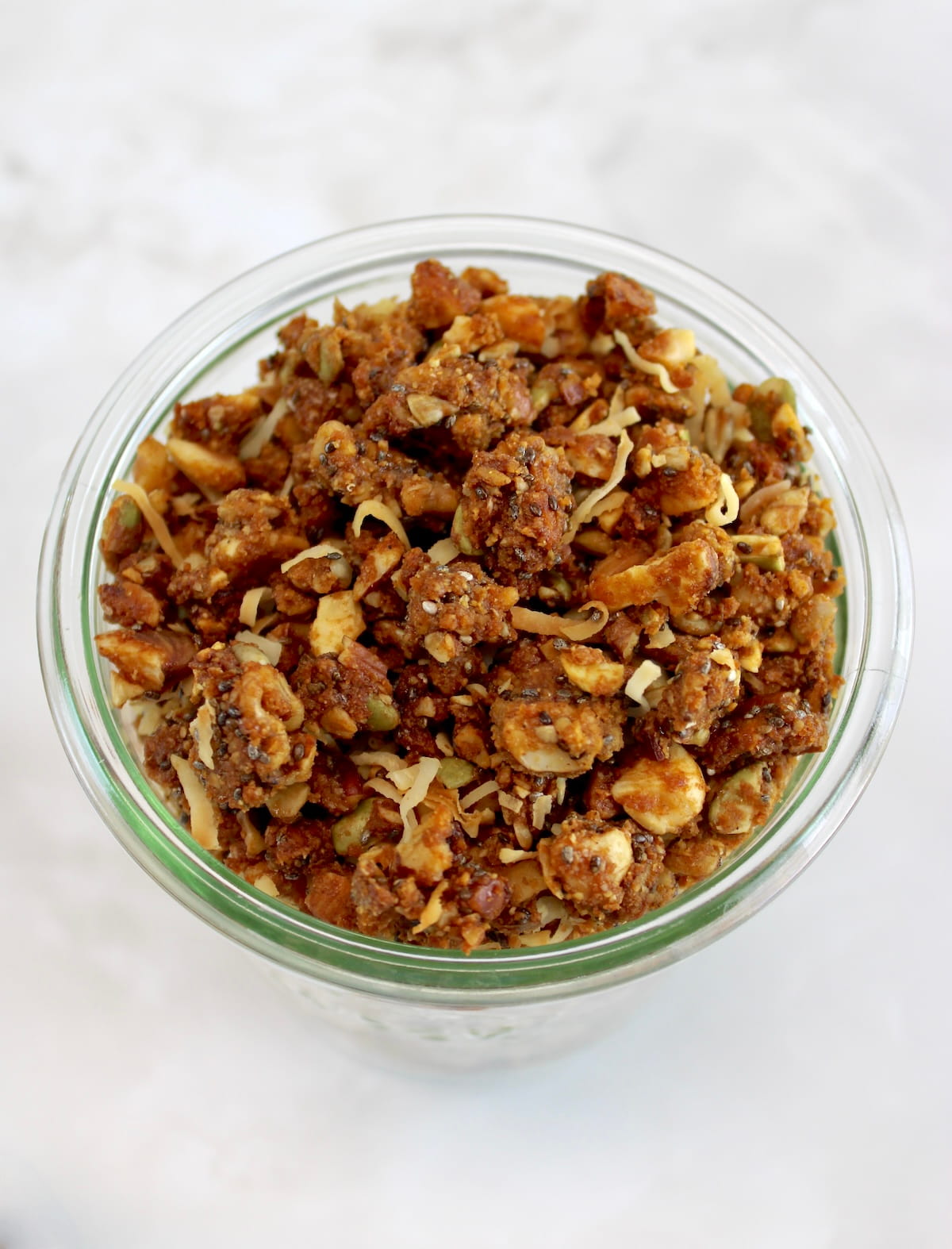 Keto Granola in open glass jar