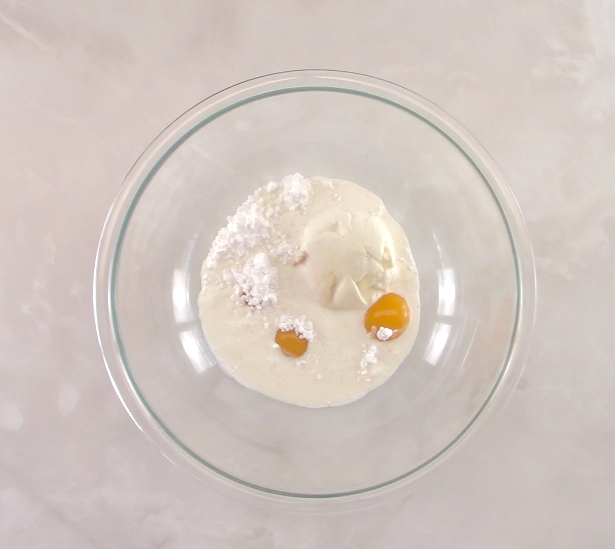 Keto Ricotta Pancake batter ingredients in glass bowl unmixed