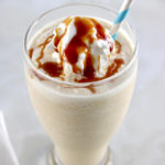 closeup of Keto Salted Caramel Milkshake with caramel and whip cream on top