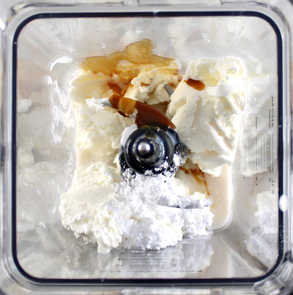 Keto Salted Caramel Milkshake ingredients in blender unmixed