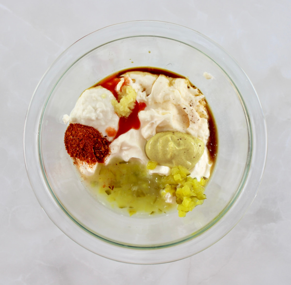 remoulade sauce ingredients in glass bowl unmixed