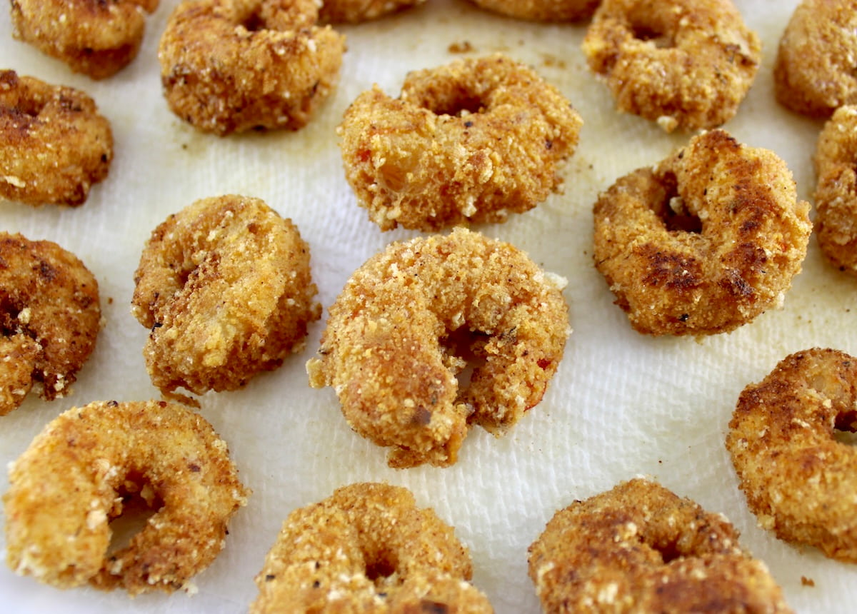 fried breaded shrimp on paper towels