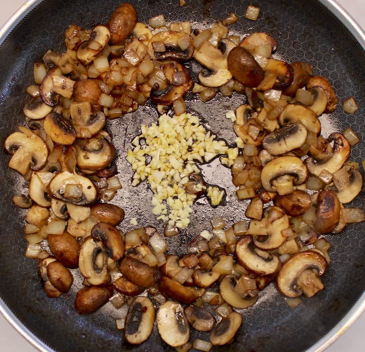 sauteed mushrooms, onions and minced garlic in skillet