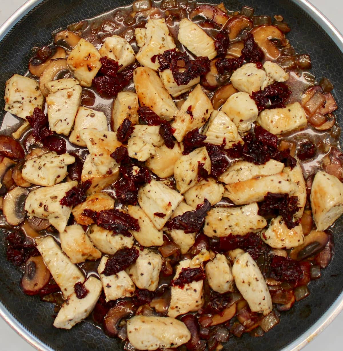 Marsala Mushroom Chicken Bites cooking in skillet