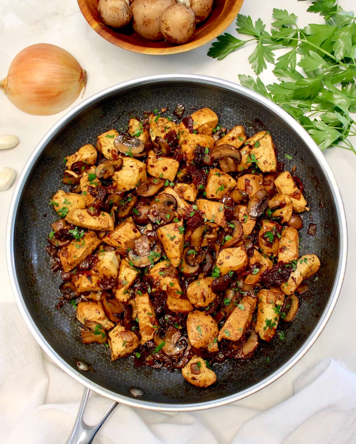 overhead view of Marsala Mushroom Chicken Bites in skillet