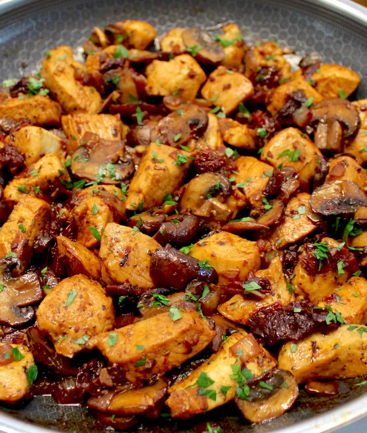 closeup of Marsala Mushroom Chicken Bites in skillet