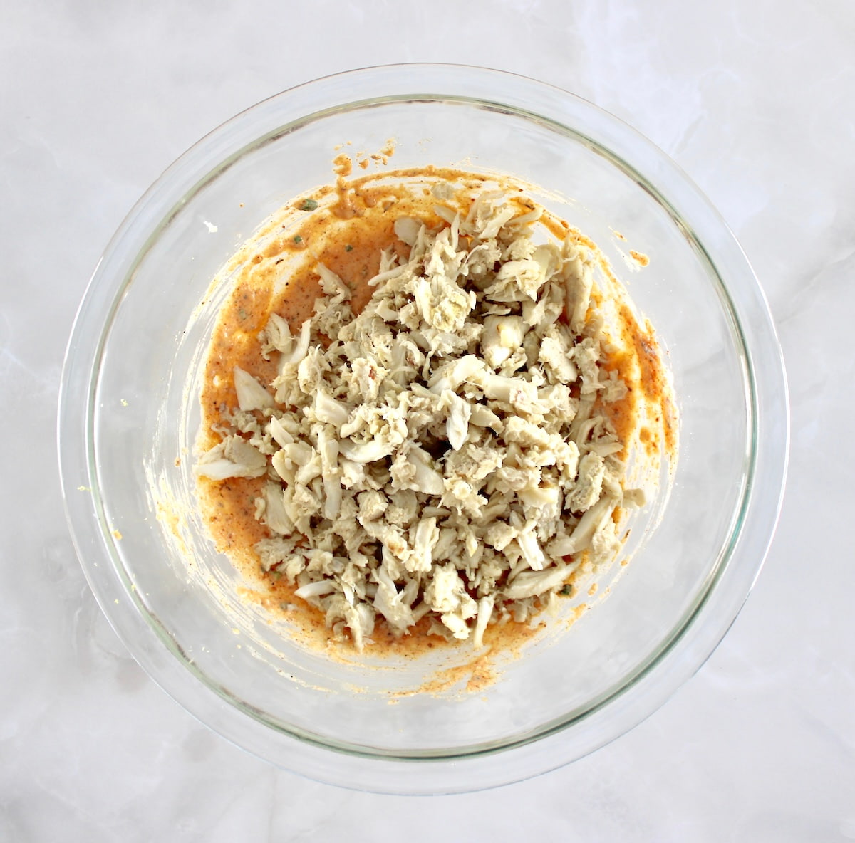 Cajun Crab stuffing ingredients in glass bowl unmixed