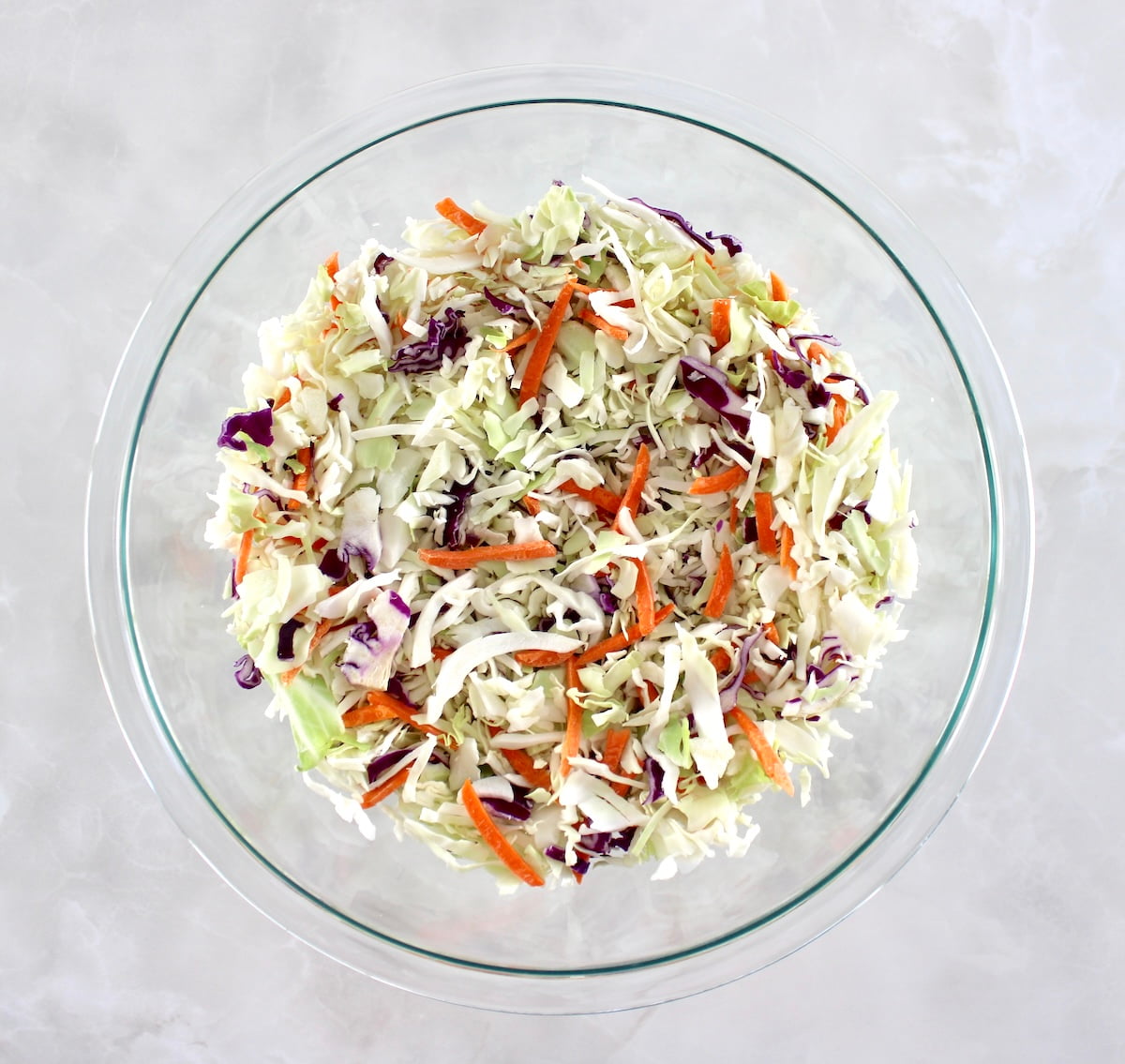 coleslaw mix in glass bowl