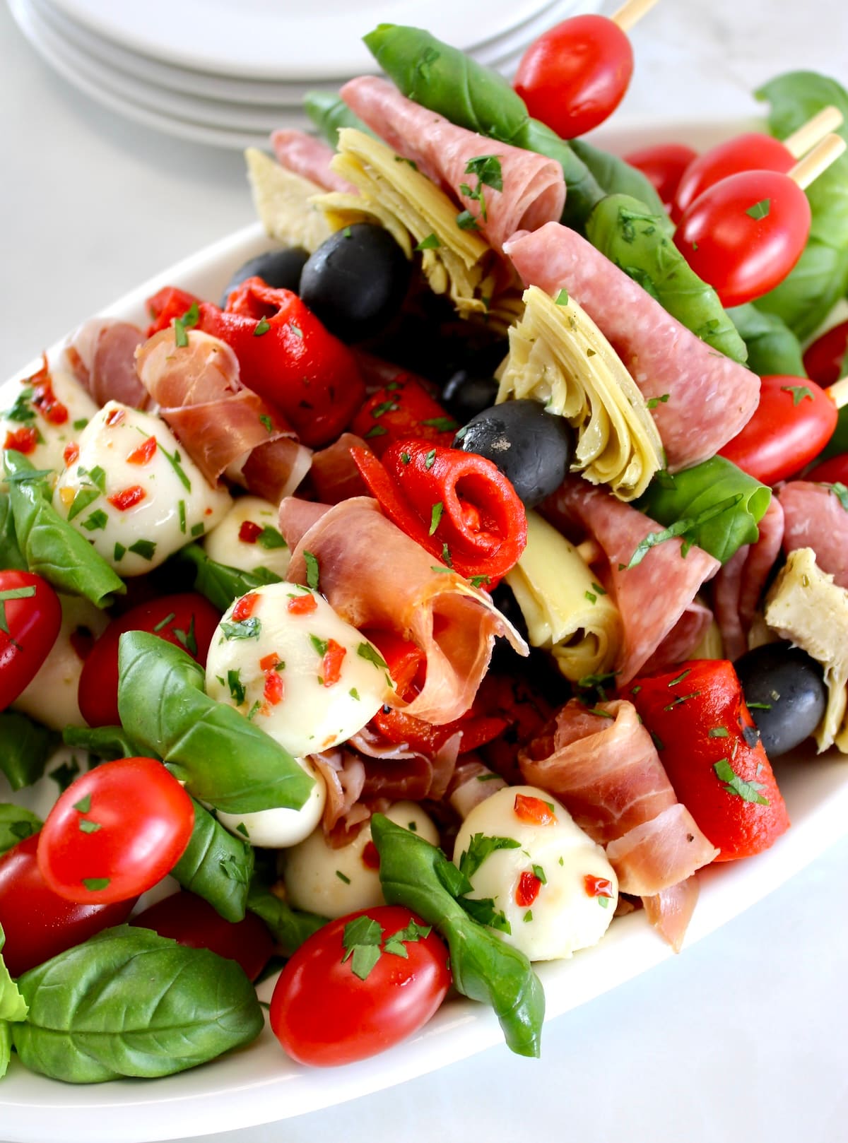 Italian Antipasti Skewers on white platter