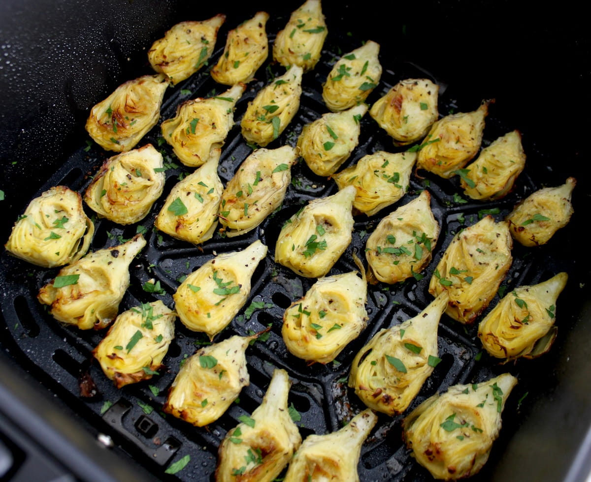 Air Fryer Artichoke Hearts in air fryer basket