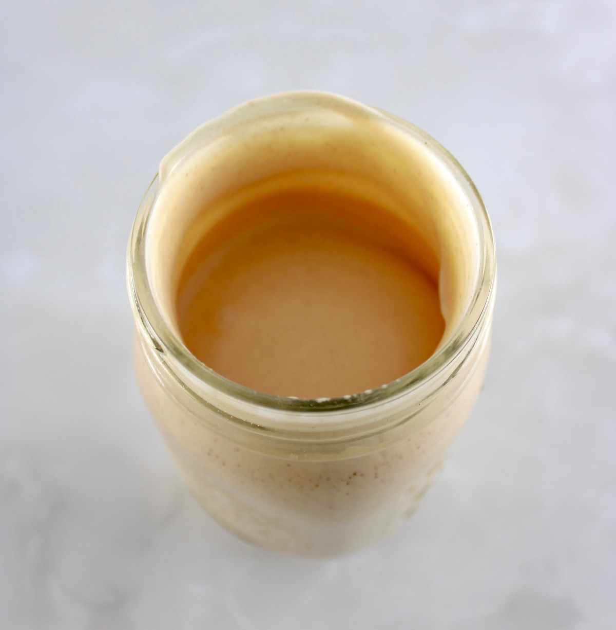 soft serve peanut butter ice cream in mason jar