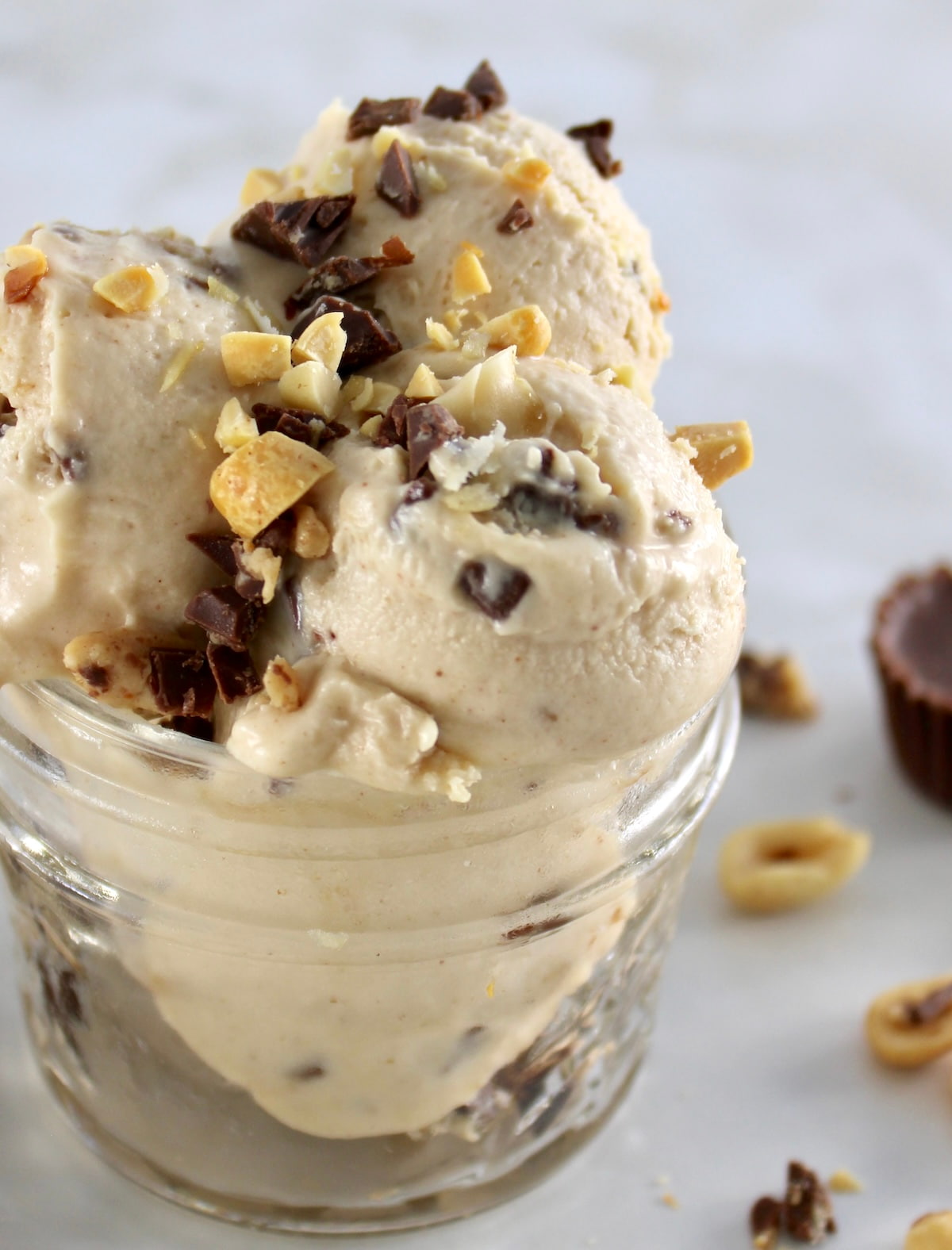 closeup side view of Peanut Butter Cup Mason Jar Ice Cream in open jar