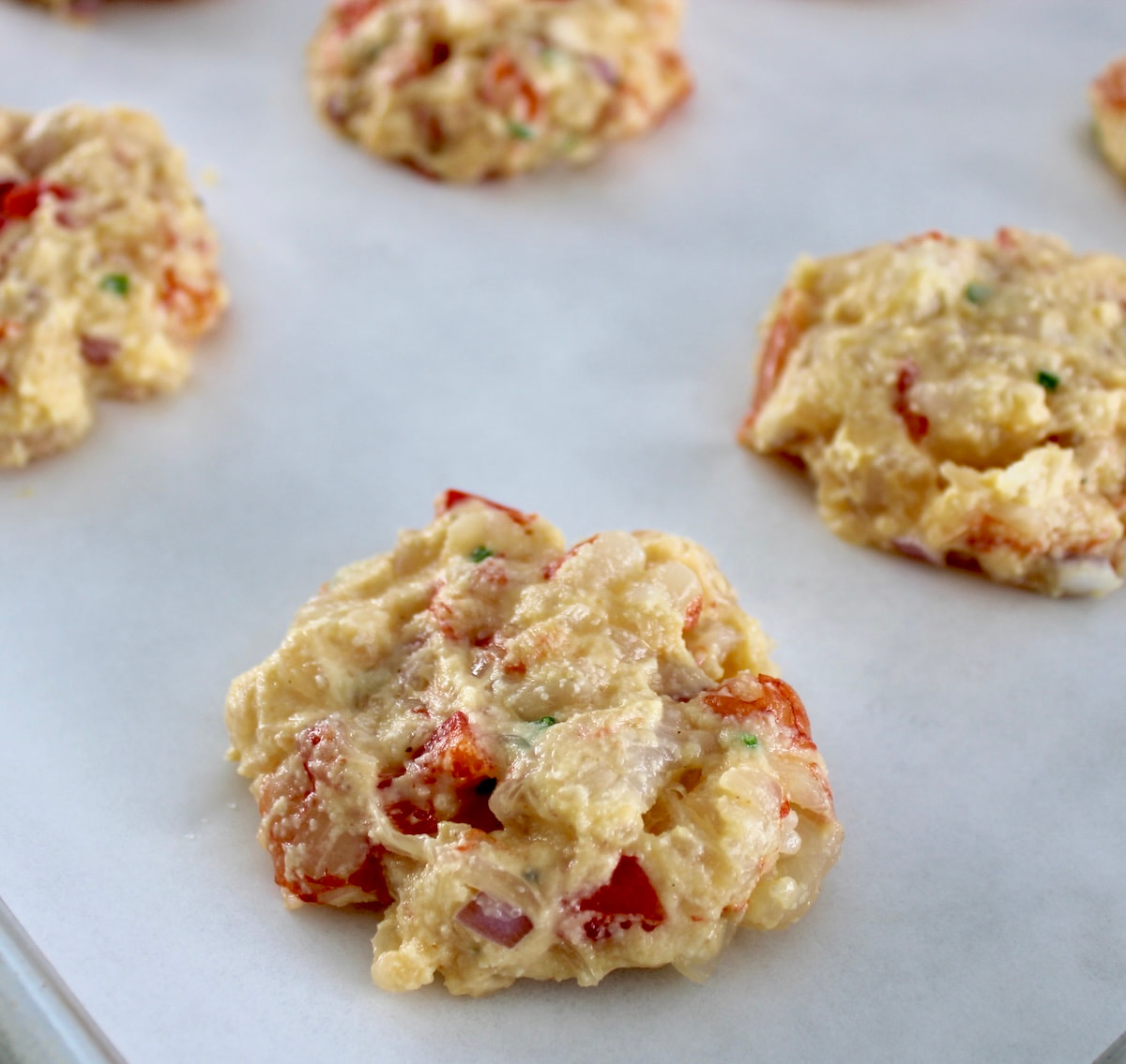 Shrimp Cakes uncooked on parchment paper