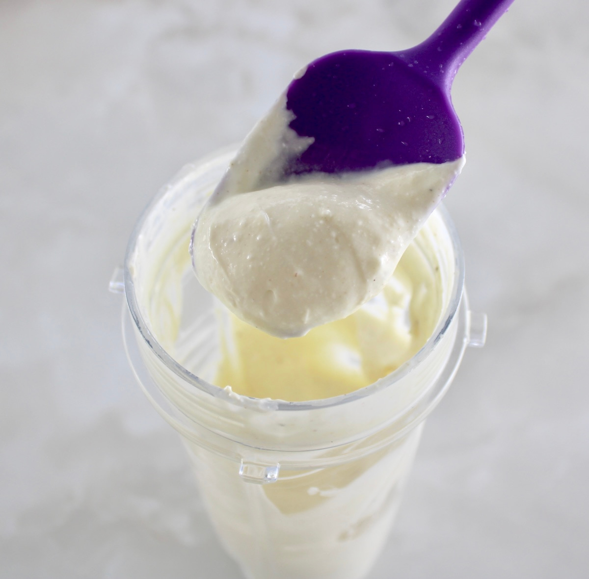 Cottage Cheese Chicken Salad dressing on purple spoon