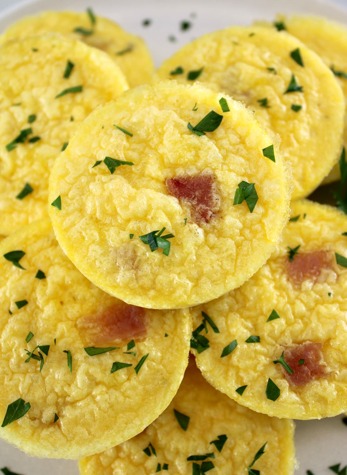 overhead view of Cottage Cheese and Ham Egg Bites with chopped parsley