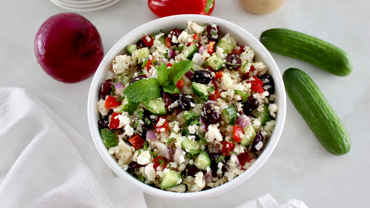 overhead view of Greek Cauliflower Rice in white bowl