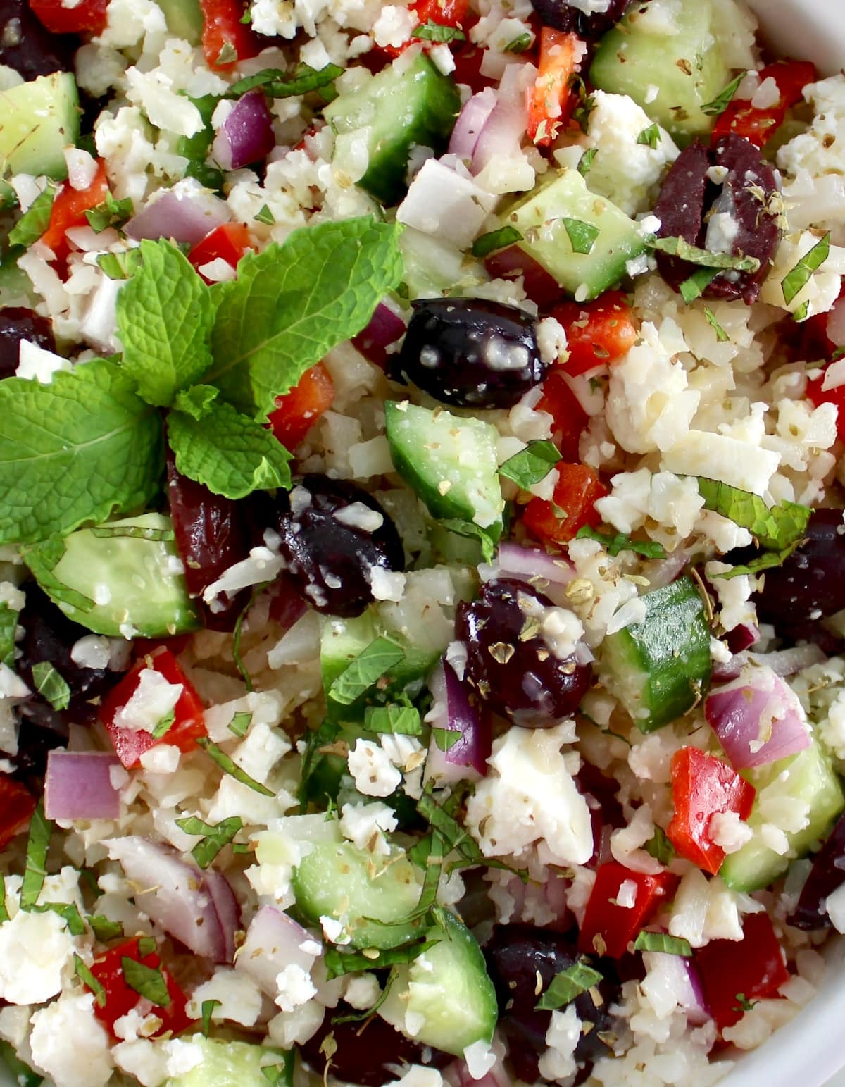 closeup of Greek Cauliflower Rice with mint sprig