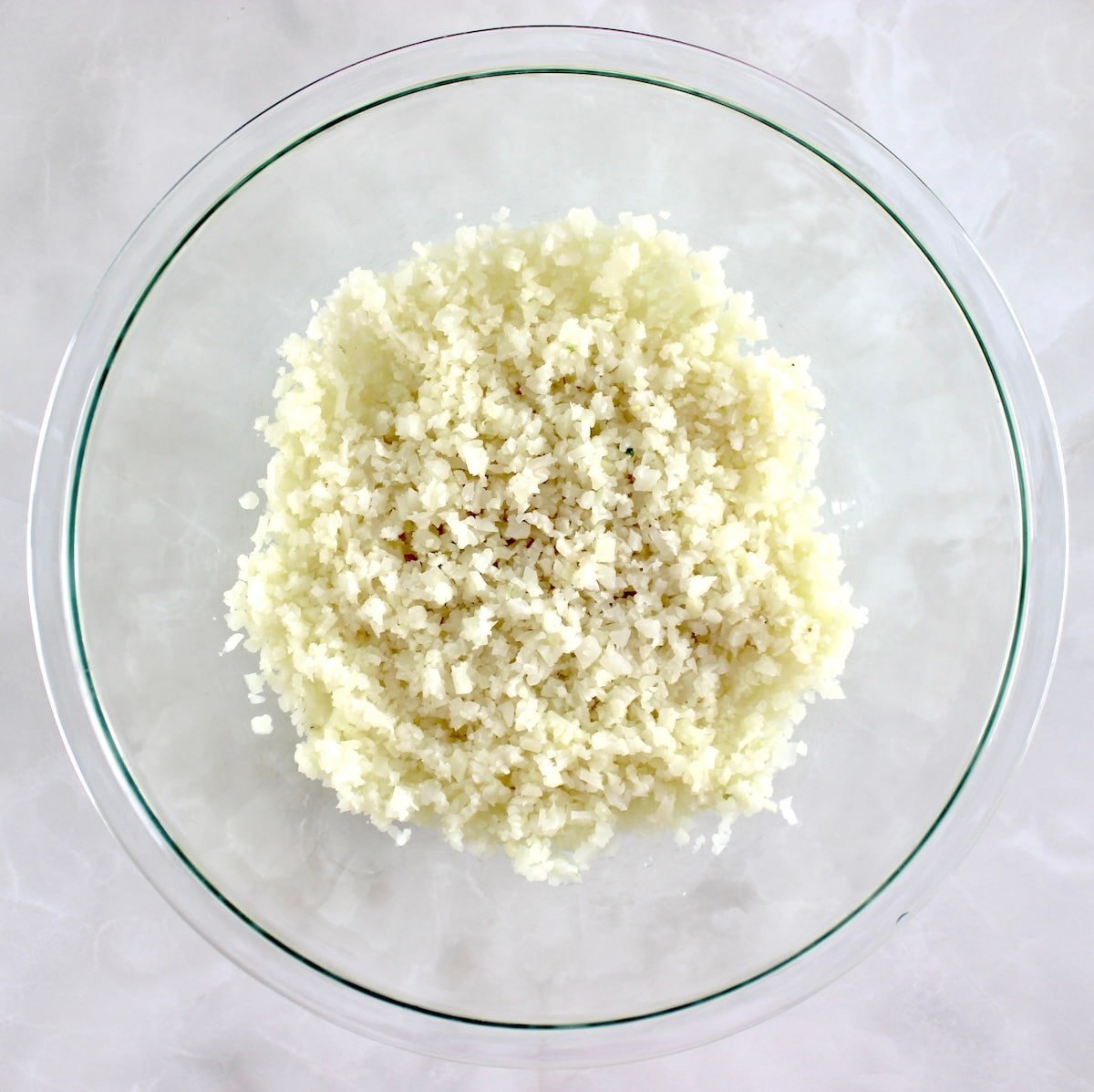cauliflower rice in glass bowl
