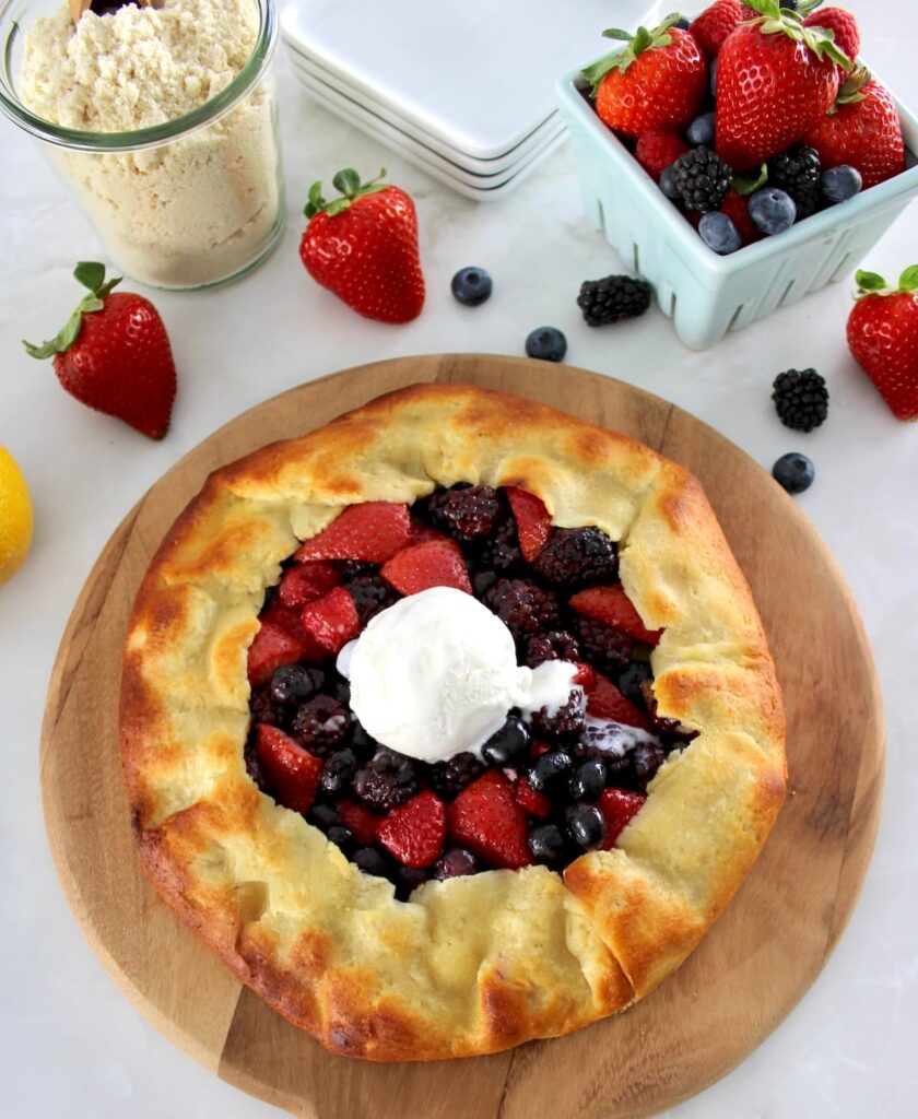 overhead view of Keto Mixed Berry Galette with vanilla ice cream in the center