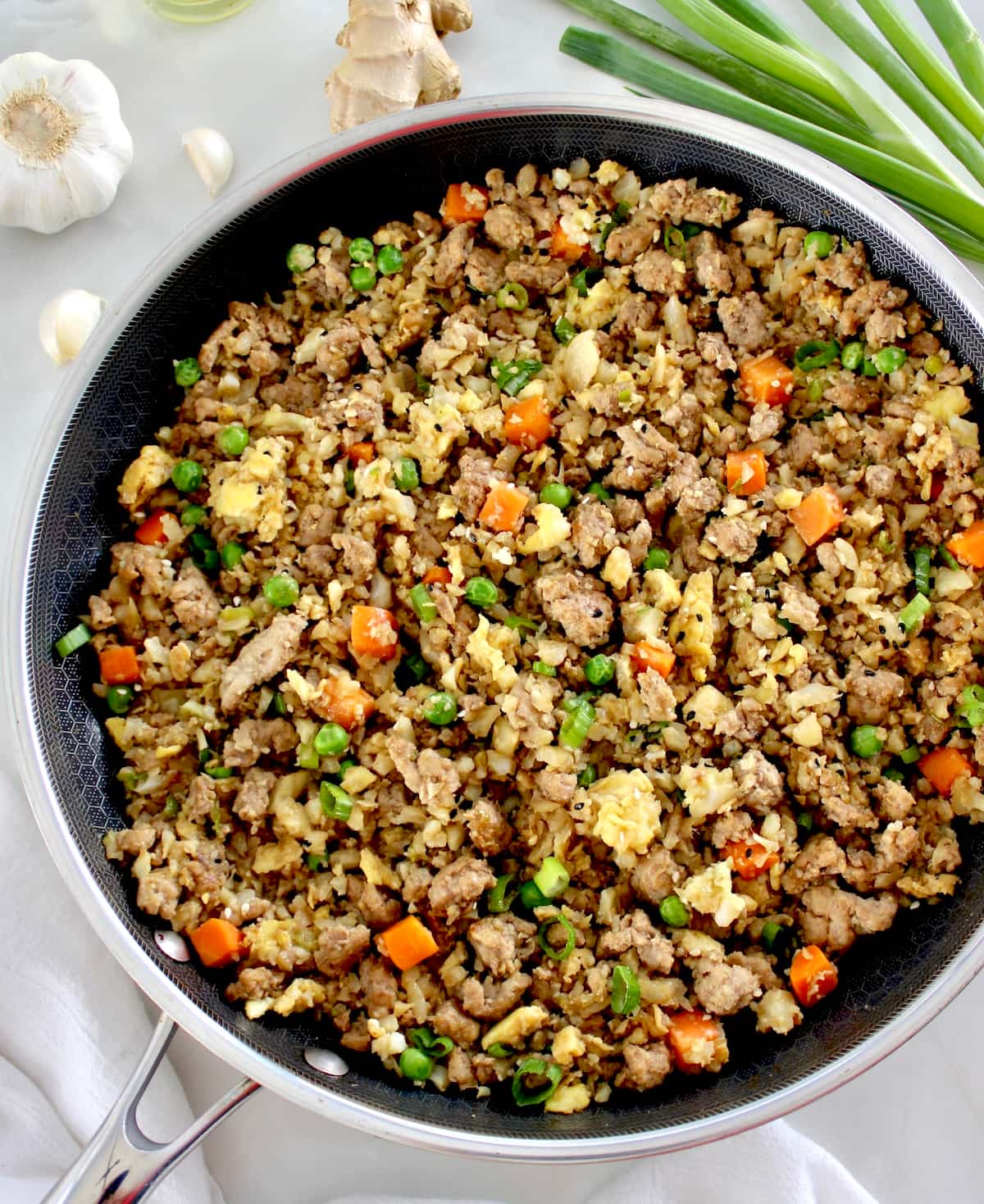 overhead view of Pork Fried Cauliflower Rice in skillet