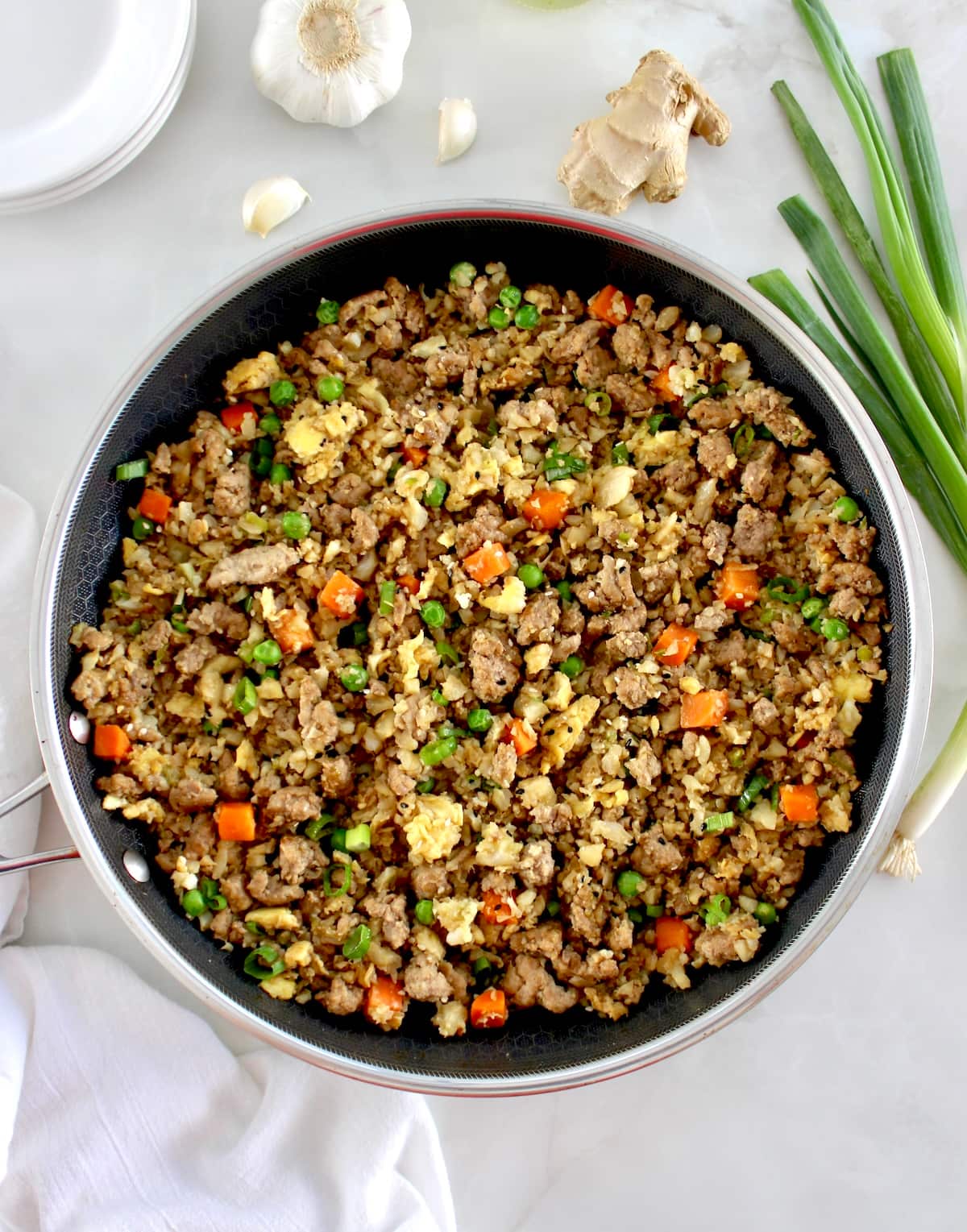 overhead view of Pork Fried Cauliflower Rice in skillet