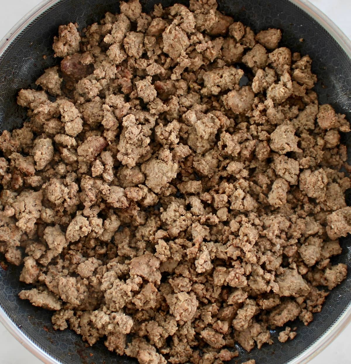 cooked ground beef in skillet